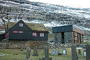 On the left: Kirkjubøargarður; on the right the ruin of Magnus Cathedral