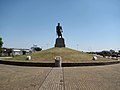 Estátua do Laçador, em sua nova localização