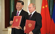 Xi Jinping and Vladimir Putin, both prominent recent figures for authoritarian capitalism Vladimir Putin and Xi Jinping (2019-06-05) 40.jpg