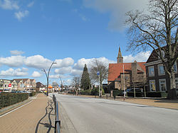 Voorthuizen, street with church in the background