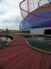 Exterior of the Richmond Olympic Oval with Water Sky Garden sculpture by artist Janet Echelman Water Sky Garden At Richmond Olympic Oval.jpg