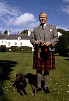 Former 3rd Duke of Fife wearing a traditional Scottish kilt skirt (1984).