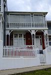 These nine houses form part of a unique terrace consisting of a row of identical late-Victorian double-stoleyed semi-detached houses which were erected at the turn of the nineteenth century and have since remained unaltered.