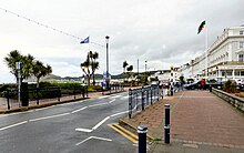 A zebra crossing on the sea front of Llandudno, with the traditional - and mandatory - 'belisha' beacons A blustery morning in Llandudno - geograph.org.uk - 4679013.jpg