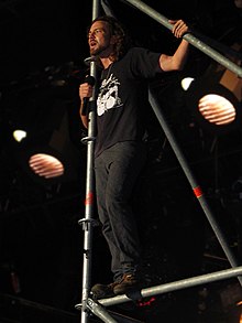 Vedder performing with Pearl Jam at Piazza del Duomo in Italy in September 2006 Eddie Vedder Pearl Jam.jpg