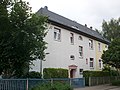 Wohnhaus in halboffener Bebauung, Teil eines Doppelwohnhauses