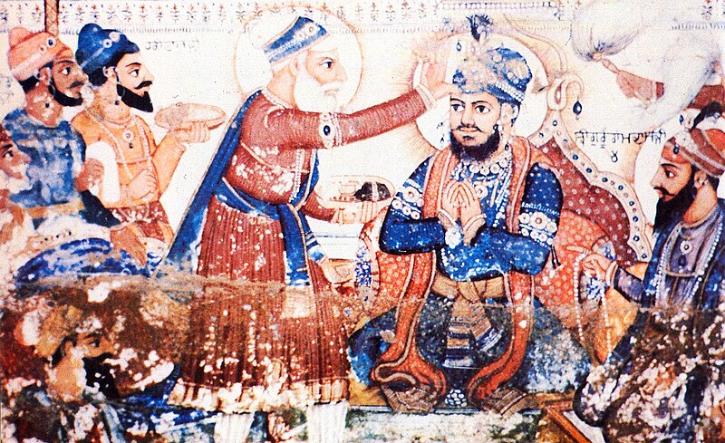 An old fresco painted on Gurdwara Ramsar in Amritsar, India, depicting the annointment of Guru Arjan as Sikhism's fifth Guru (source: wikipedia.org)