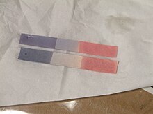 An example of litmus paper which is used to test for chlorine gas.
