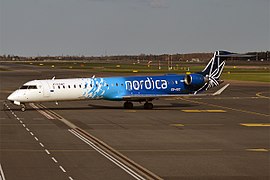 Bombardier CRJ-900ER i Nordicas farger på Lennart Meri Tallinn lufthavn i Tallinn.