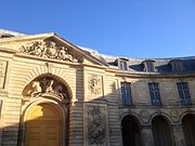 The façade of the Petite Écurie, entrance to the Sculpture Gallery.