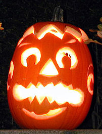 A pumpkin carved into a Jack-o'-lantern for Ha...