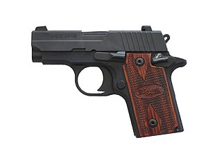 English: A P238 pistol chambered for .380 ACP ...