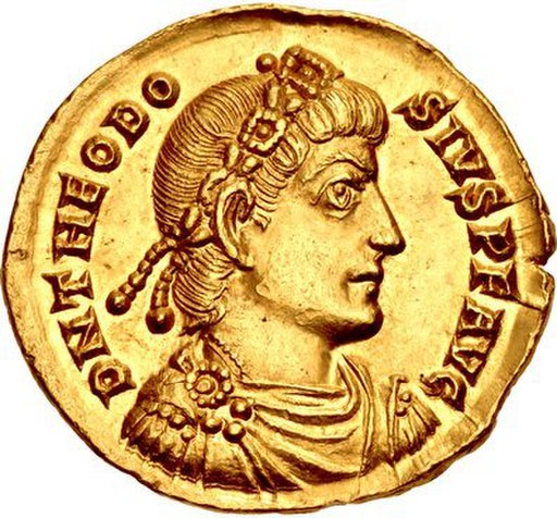 Golden coin depicting man with diadem facing right
