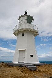 Photo d'un phare blanc à pans coupés