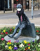 The "Wee Annie" statue in Gourock, Scotland, was given a face mask during the pandemic. Wee Annie, Kempock Street, face mask.jpg