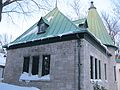 Not bell roofs but roofs with bell-cast eaves.