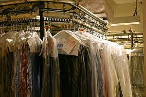Many dry cleaners place cleaned clothes inside...
