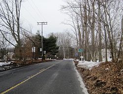 Approaching the center of Elys Corner from eastbound CR 1