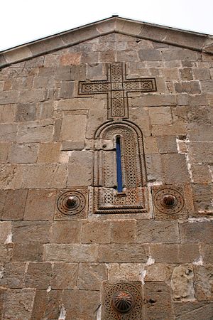 English: Gergeti Trinity Church cross relief