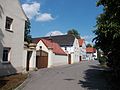 Wohnstallhaus, Seitengebäude und zwei Toranlagen eines Vierseithofes