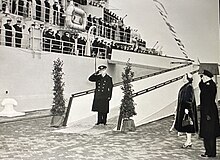 HNLMS De Ruyter placed into active service in the presence of Her Majesty Queen Juliana of the Netherlands (right). Captain WJ Kruys on the left (1953)