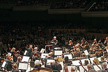 Peter Oundjian conducting the TSO at Roy Thomson Hall in June 2014 Peter Oundjian - Conductor of Toronto Symphony Orchestra 2014.jpg