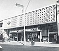 Premier Supermarket on Station Road (1963), now an Iceland supermarket; the site was originally home to the Harrow Coliseum cinema which was demolished in 1956[100]