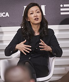 Sue Mi Terry speaking at a conference in 2018