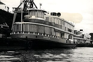 Kosciusko boarded up ready for the tow to Hobart following the collapse of the Tasman Bridge, 1975