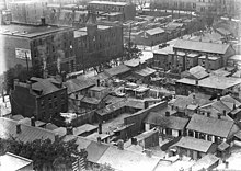 The Ward, c. 1910. Toronto's first Chinatown was situated in The Ward, an area that attracted new immigrants to the city. The Ward as viewed from Eaton factory.jpg