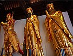 Jade Buddha Temple (Shanghai, China) - Statues of Pañcika (Sànzhī Dàjiàng) on the left, Indra (Dìshìtiān) in the centre and Brahma (Dàfàntiān) on the right.