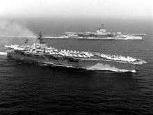 America (foreground) cruising with Ranger in the Gulf of Tonkin in 1973 USS America (CVA-66) and Ranger (CVA-61) off Vietnam in 1973.jpg