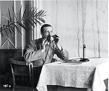 Alan Gordon-Finlay trialling the Hush-A-Phone at the League of Nations, c. 1927 - ILO Historical Archives Alan ILO 1927 195A.jpg