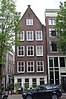 Huis met etagewoningen, in de historiserende stijl van de jaren 1930