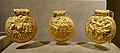 Trzy złote przywieszki (Nry inw. 13409–13411)