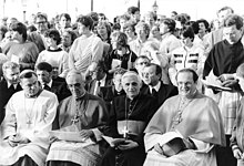 Katholikentag, Dresden, 1987
(left to right) Bishop Karl Lehmann and Cardinals Gerhard Schaffran, Joseph Ratzinger (the future Pope Benedict XVI) and Joachim Meisner Bundesarchiv Bild 183-1987-0710-035, Dresden, Katholikentreffen.jpg