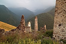 Typical Ingush medieval castle. Many of the towers and walls were destroyed by Russian army in 19th and 20th centuries. Erzi, Ingushetia, Erzi towers 3.jpg