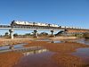 A Fortescue Metals Group ore train crosses the Turner River in July 2008