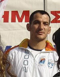 Pyrros Dimas is the top Greek Olympic medalist having won three gold and one bronze medal in weightlifting. Piros dimas dion.JPG