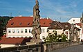 Скульптура святого Адальберта на Карлову мосту в Праге