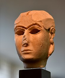 Head of a woman discovered at Uruk, the 'Mask of Warka'. Warka mask (cropped).jpg