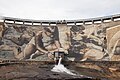 Central Panel of mural artwork with water outlet flowing