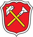 Stadt Schwarzenbach a. Wald In Rot schräg gekreuzt ein silberner Bergmannshammer und ein silbernes Schürfgerät mit goldenen Stielen
