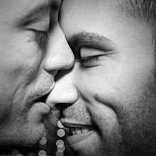 Two men kissing. Kiss Ryan Gilbert + Michael Correntte 20100117.7D.02106.P1.L1.SQ.BW SML (4329689568).jpg