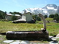 Image 28In the summers the cows are brought up to the high mountain meadows for grazing. Small summer villages such as the one shown in this photograph taken in Savoy are used. (from Alps)