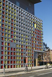 Main entrance is concealed at the corner MIT Simmons Hall (8222188145).jpg