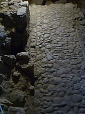 The surface of Marlin's Wynd, one of the suppressed closes of the Royal Mile. It was concealed when built over and rediscovered after excavation in 1974 Marlin's Wynd under the Tron Kirk.JPG
