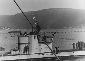 U-255 at Narvik flying four victory pennants and the flag of the merchant ship SS Paulus Potter after the attack on the ships of Convoy PQ 17