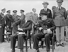 Winston Churchill (right, during the Atlantic Conference), consistent advocate of continential European integration, later along with his son-in-law Duncan Sandys President Roosevelt and Winston Churchill seated on the quarterdeck of HMS PRINCE OF WALES for a Sunday service during the Atlantic Conference, 10 August 1941. A4815.jpg