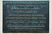 Tablica upamiętniająca Jerzego Franciszka Kulczyckiego, wmurowana w elewację kamienicy od strony ul. św. Tomasza